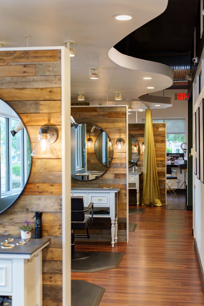 A stylist at work on the floor at Larkspur Salon Spa in Raleigh.